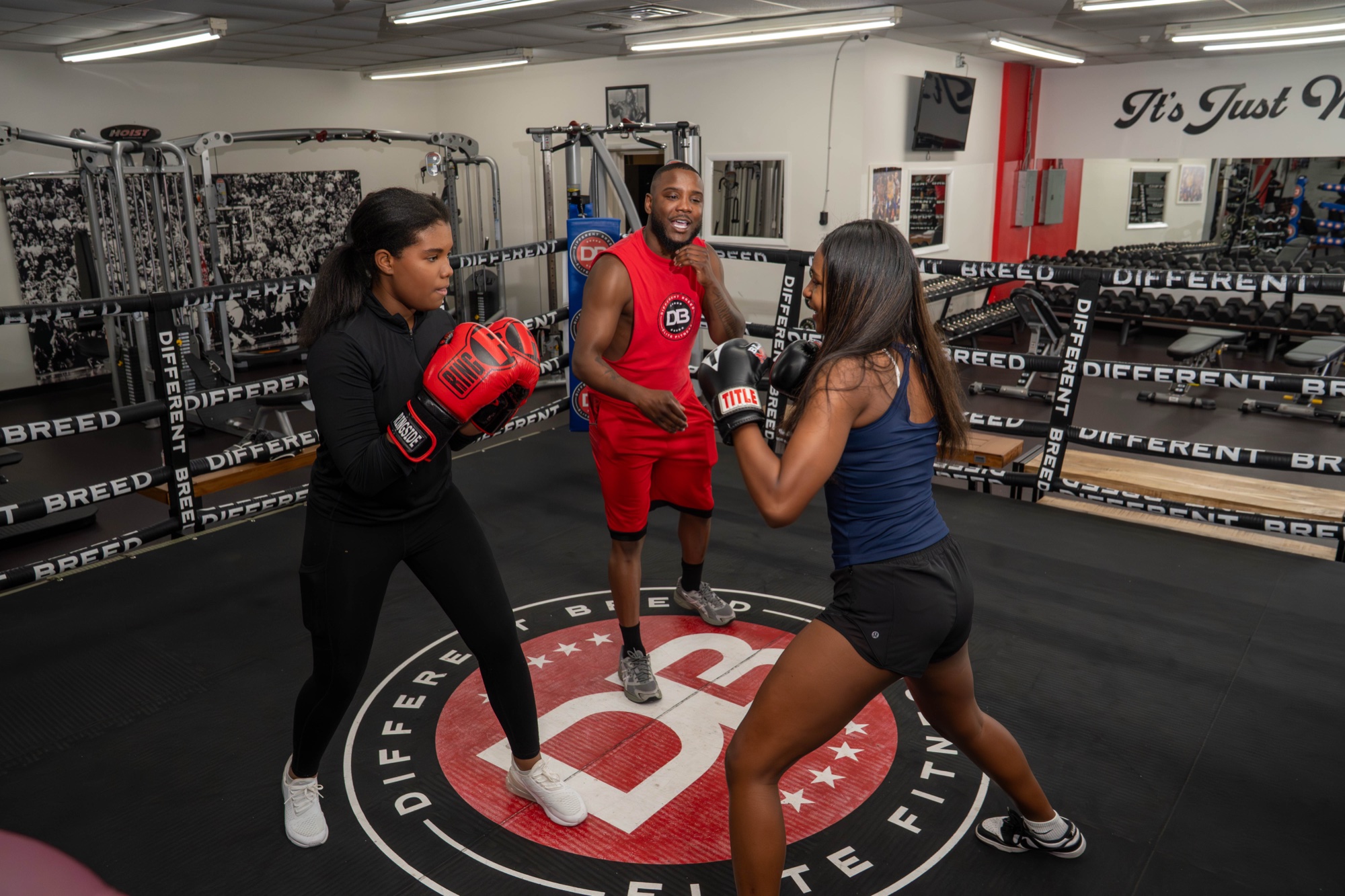 A Different Breed coach running mitt work with a client